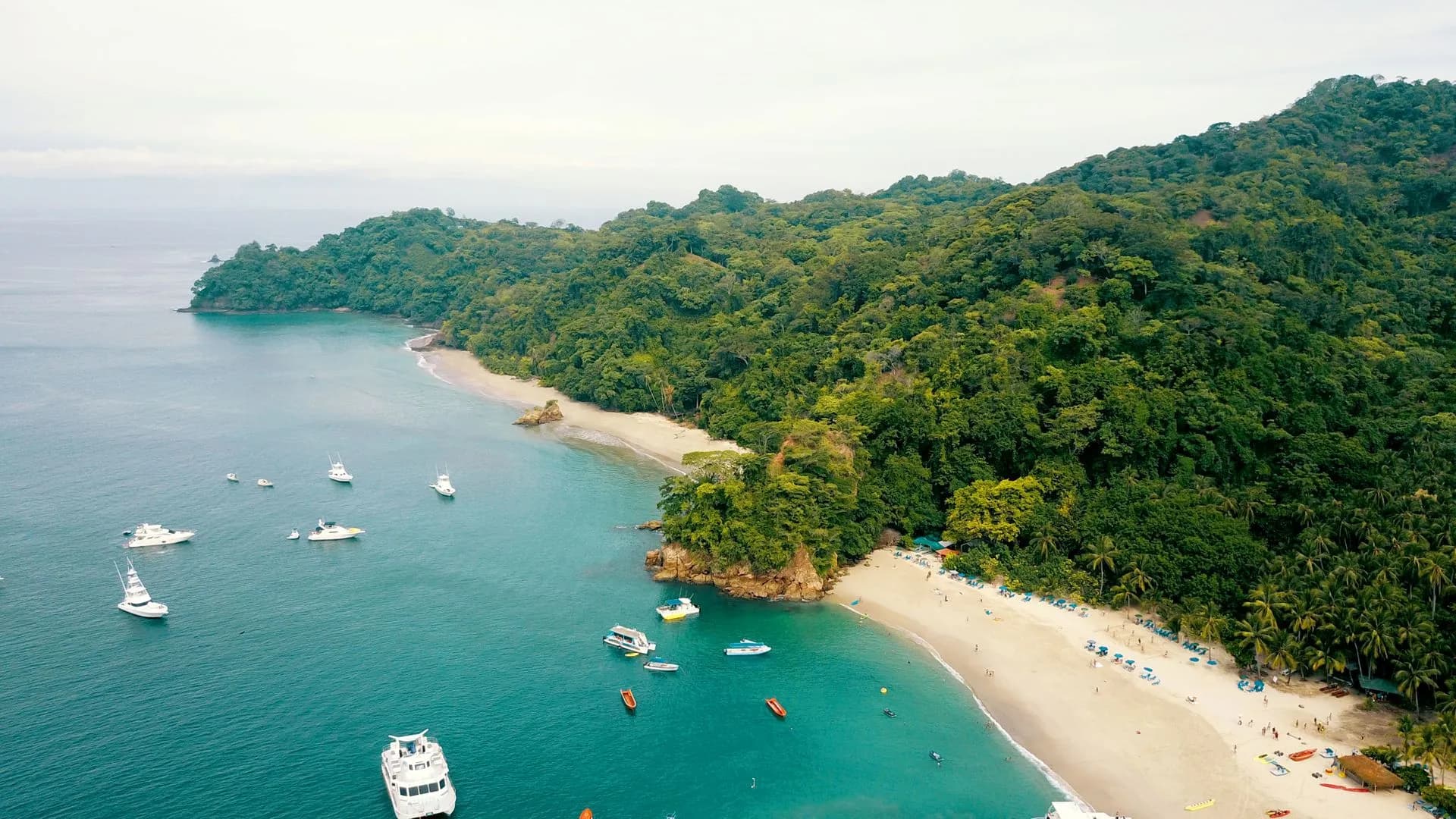 Hillside boutique hotel infinity pool overlooking the rainforest and Pacific Ocean in Manuel Antonio, Costa Rica