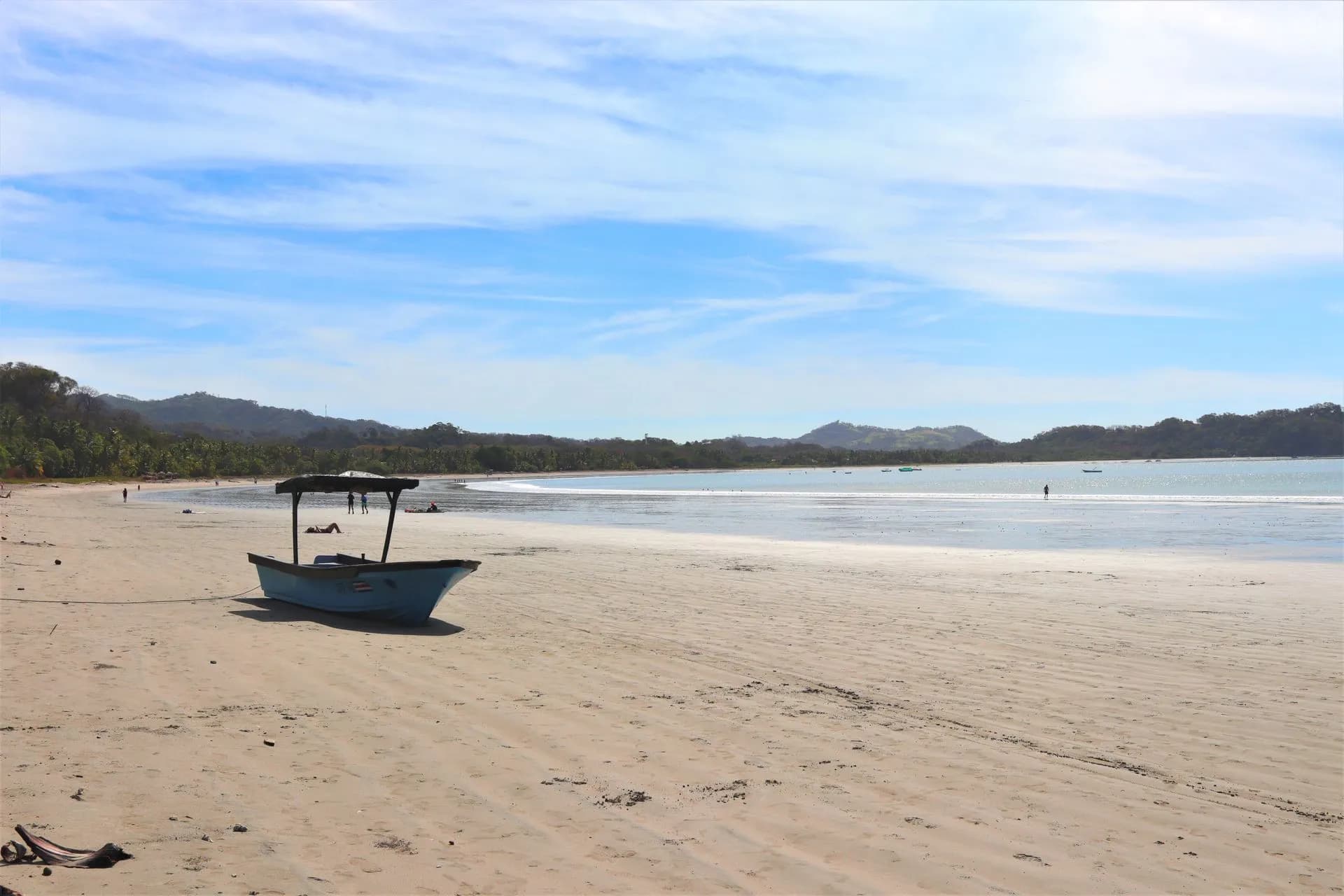 Offshore wind holding up a clean wave face at Playa Tamarindo during peak Papagayo season in Guanacaste, Costa Rica